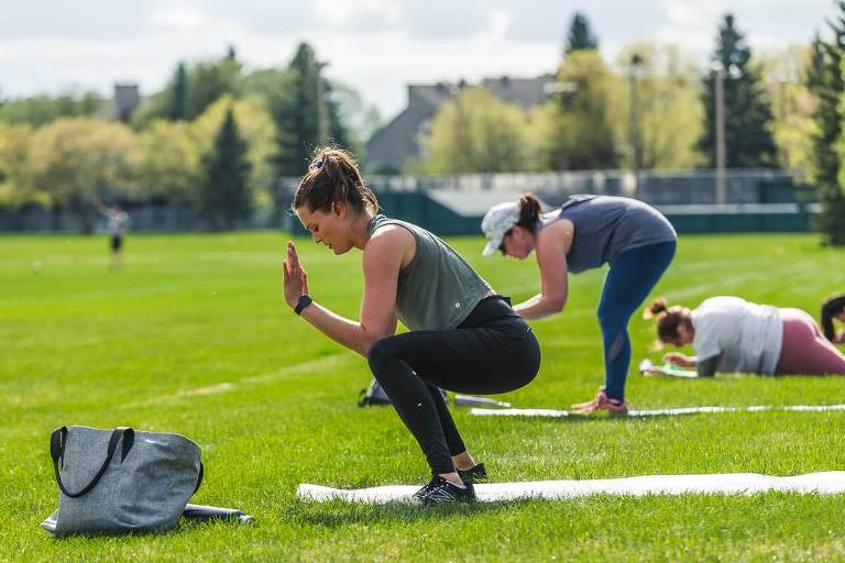 People participate in an outdoor bootcamp in St. Albert