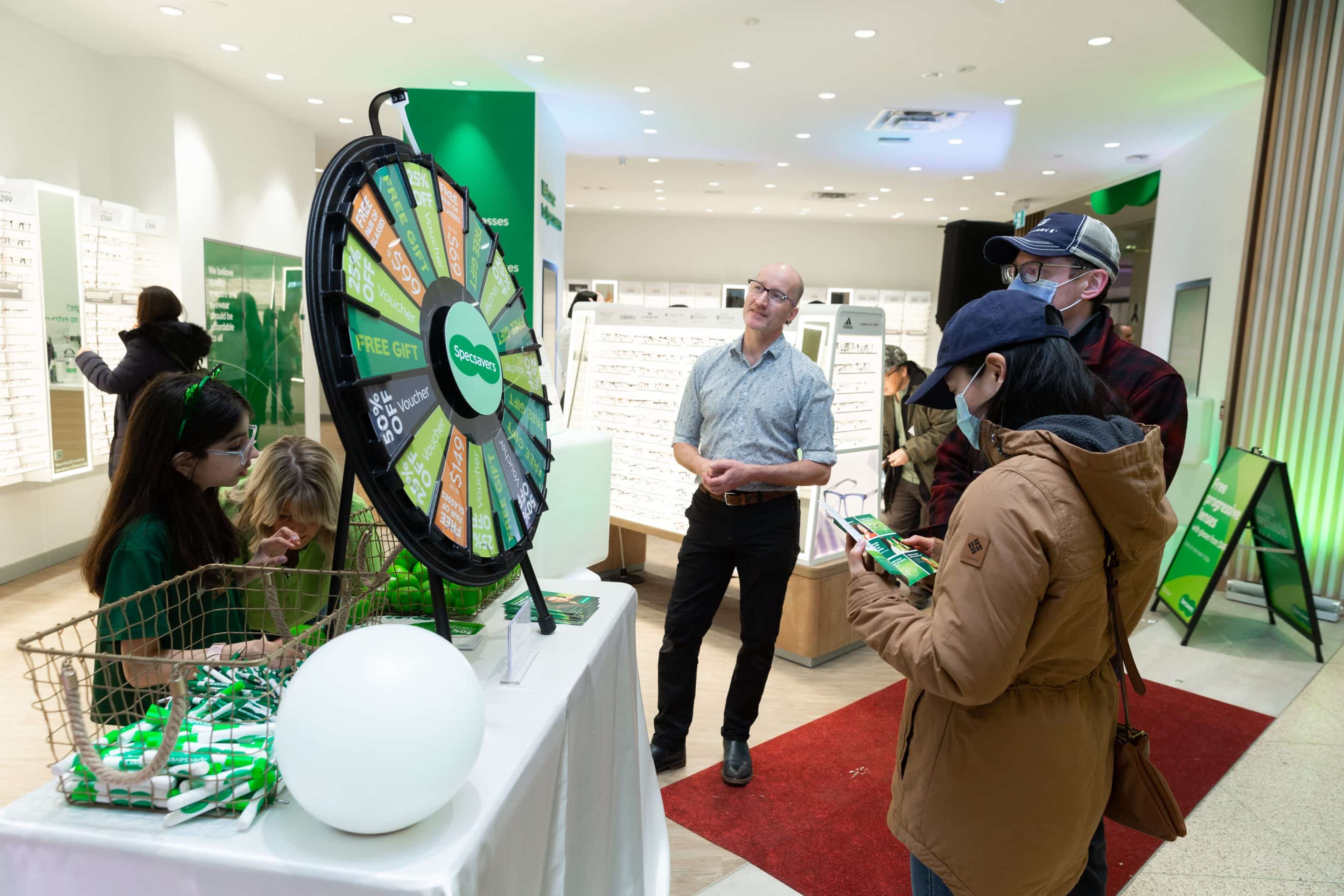 20230317_Specsavers_139 Guests interact with a prize station at the grand opening of Specsavers in West Edmonton Mall