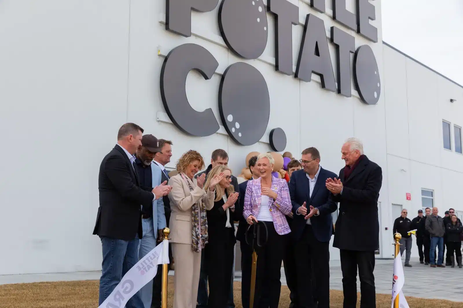 edmonton-event-photographer-grand-opening-ribbon-cutting-1600 Event photography of the ribbon cutting ceremony for the grand opening of the Little Potato Co new facilities in NIsku Alberta