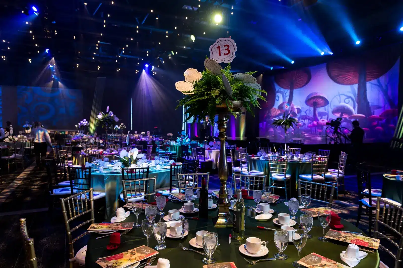 Themed gala table design and lighting at Edmonton corporate fundraiser