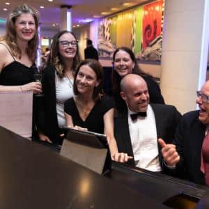 edmonton-event-photography-square-2 Edmonton Event Photography - Guests interact with performer Matt Day at the Edmonton Convention Centre Hall D